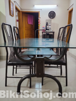 Glass Dining Table with six chairs.